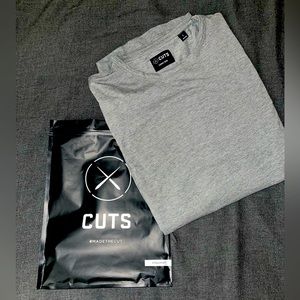 Cuts clothing, long sleeve shirt. Never used